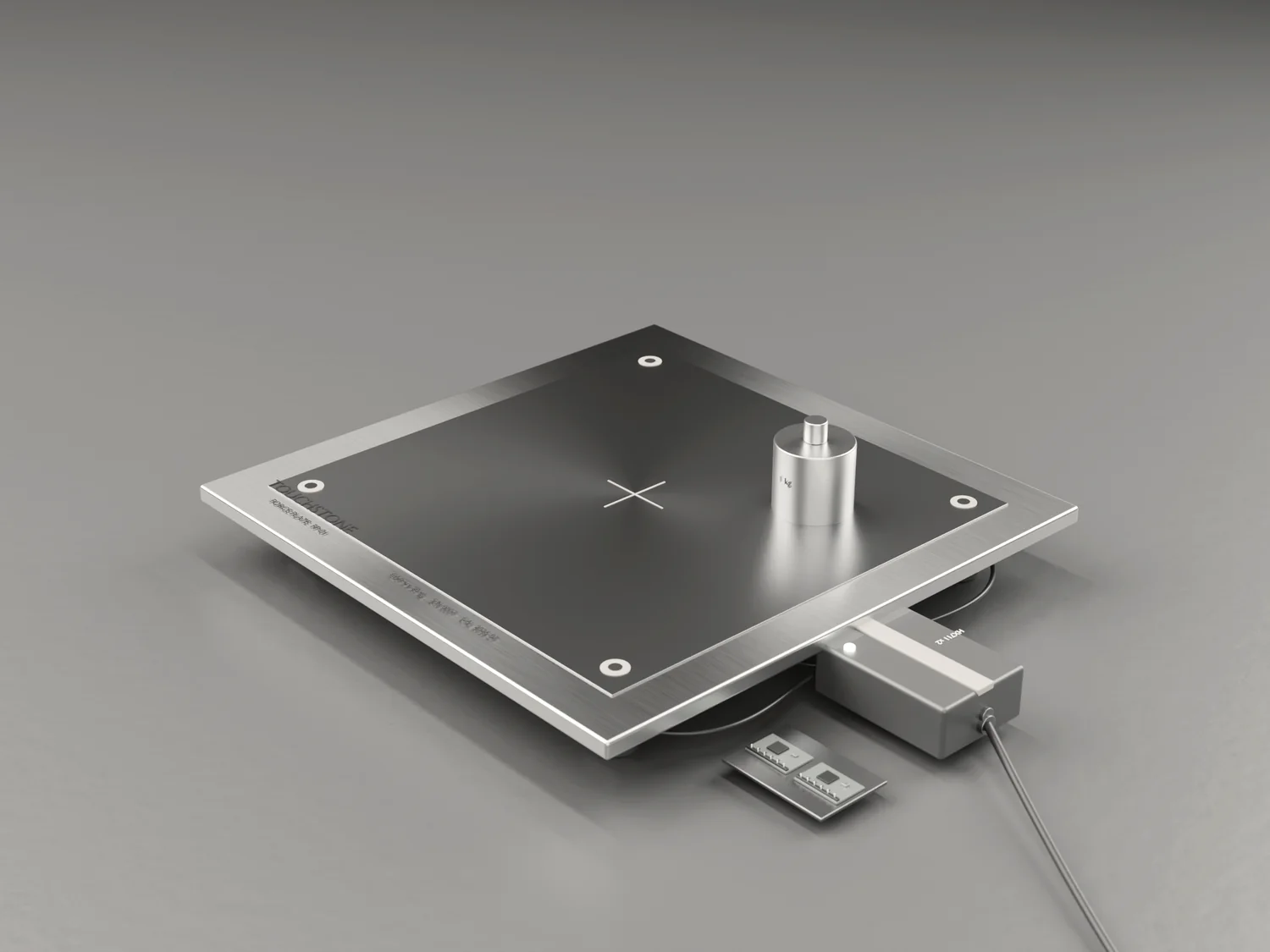 Reference force plate with a one-kilogram calibration mass resting on it.